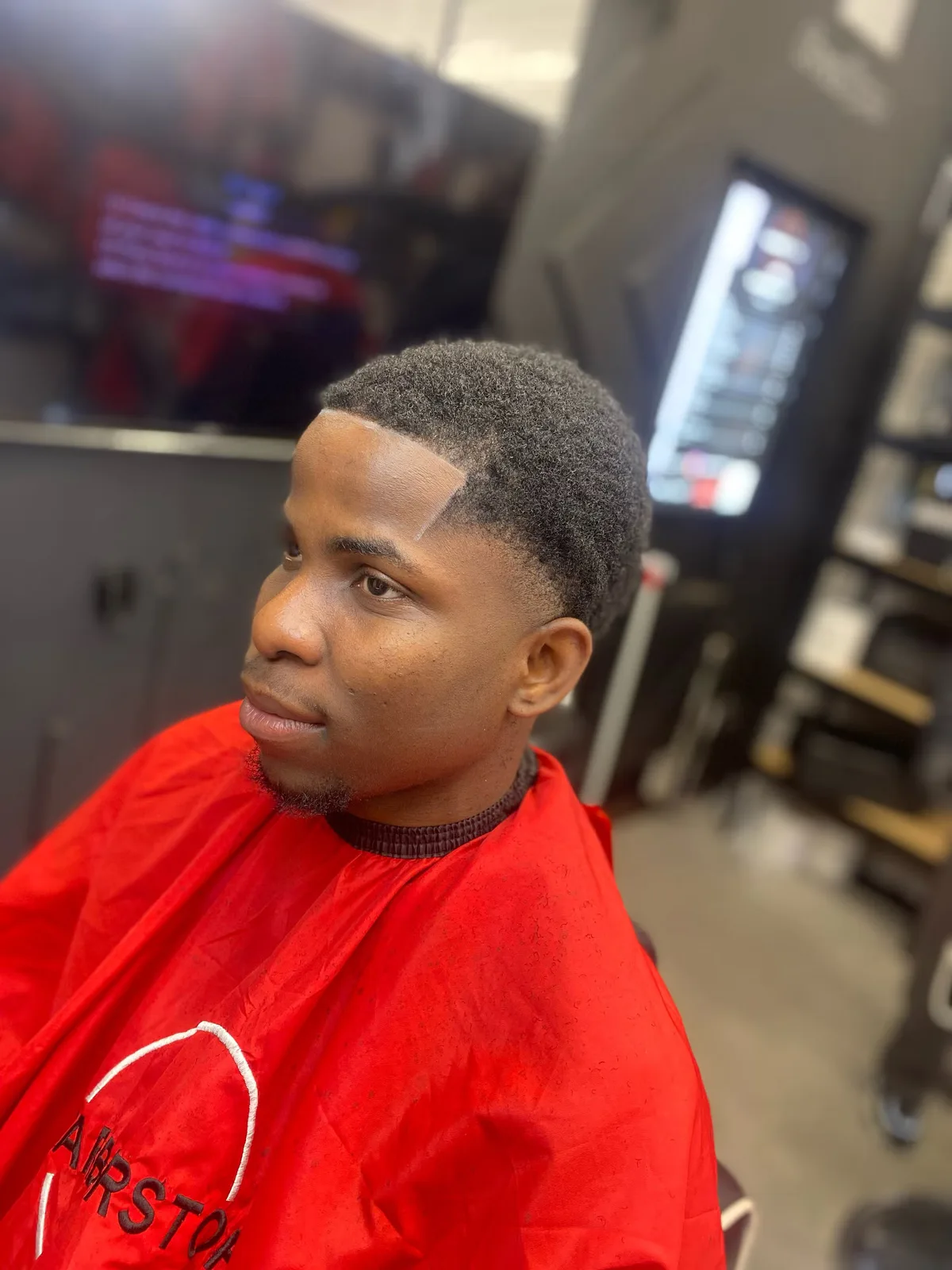 Side-profile fade with a defined beard line