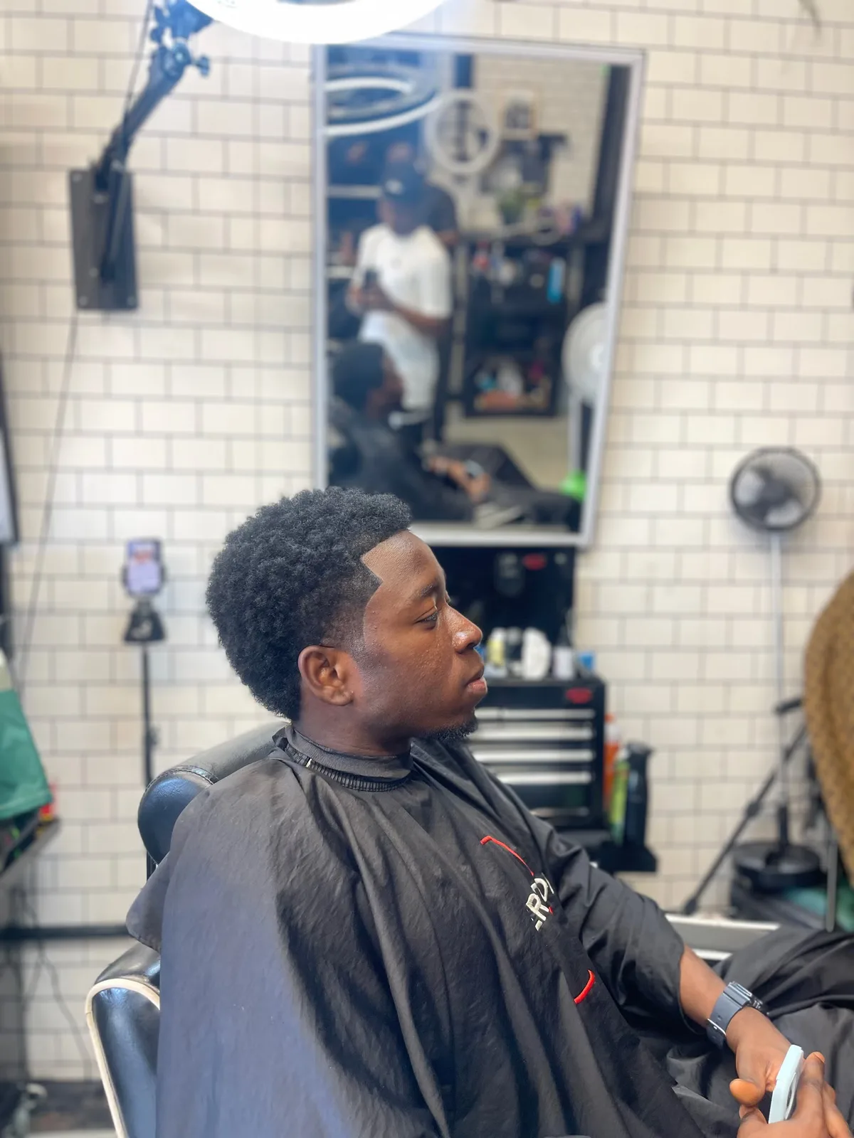 Afro shape-up with a clean line-up in the chair